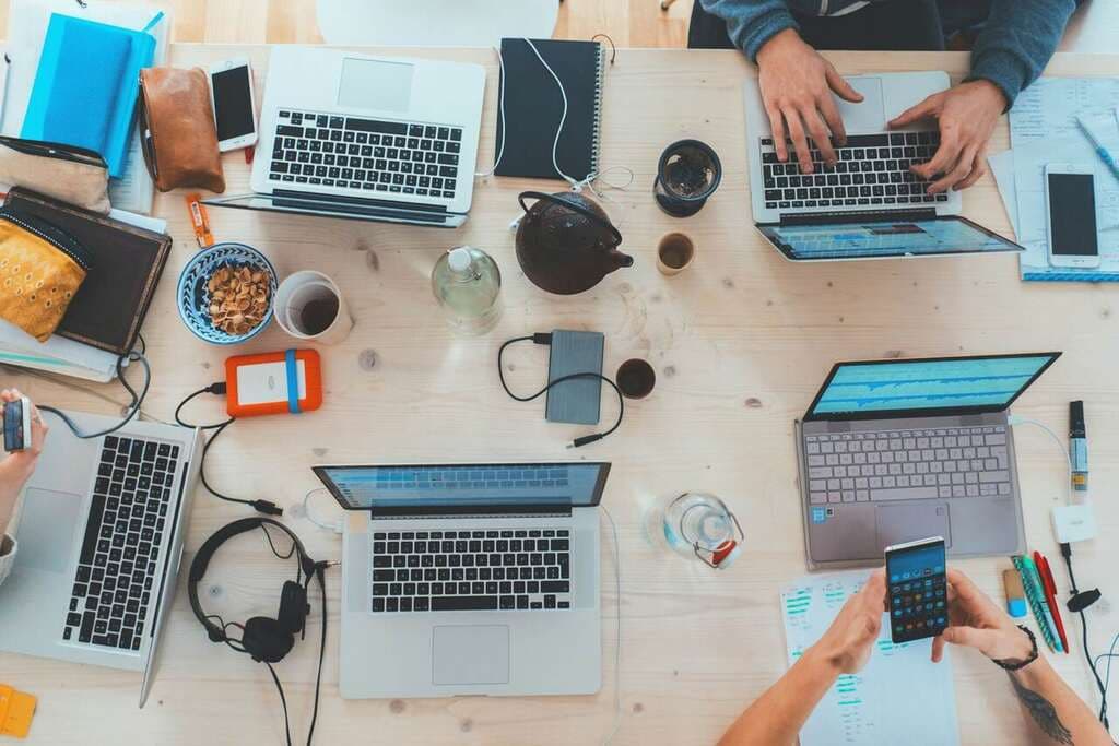 Talentbes consultants collaborating on a hiring plan