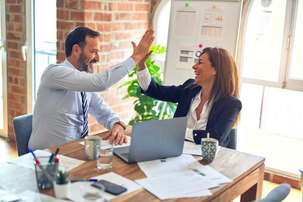 A Talentbes client team closing a successful hire